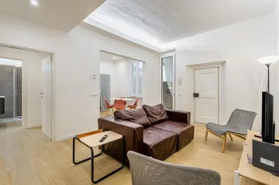 Area soggiorno di GuestHost - Giardino della Fortezza Modern Apt x6 with Patio