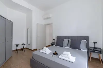 Letto o letti in una camera di Elegant Escape