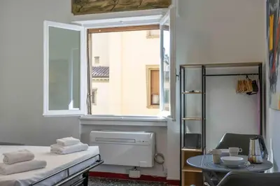 Letto o letti in una camera di Santa Felicita Studio - Ponte Vecchio