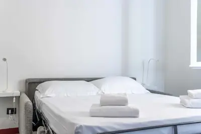 Letto o letti in una camera di Santa Felicita Studio - Ponte Vecchio