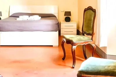 Letto o letti in una camera di The Santa Croce Palace By San Firenze Collection