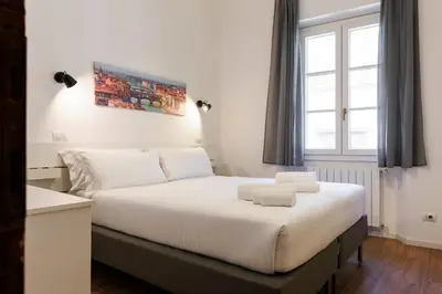 Letto o letti in una camera di Santa Croce Elegant Apartment