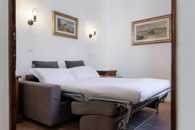 Letto o letti in una camera di Santa Croce Elegant Apartment