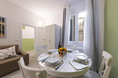 Area soggiorno di Apartments Florence - Divina Apartment