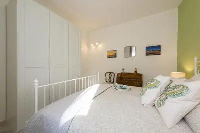 Letto o letti in una camera di Apartments Florence - Divina Apartment