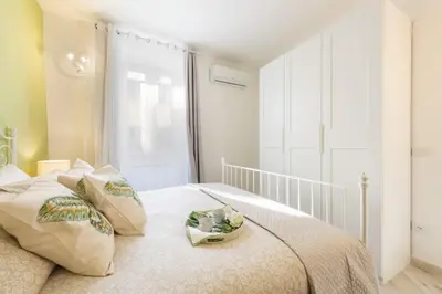 Letto o letti in una camera di Apartments Florence - Divina Apartment