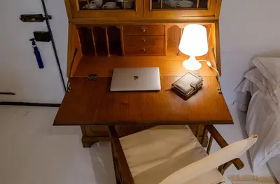 Letto o letti in una camera di Acacia Firenze - Anteo