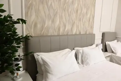 Letto o letti in una camera di Cattaleya rooms