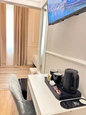 TV o dispositivi per l'intrattenimento presso Cattaleya rooms