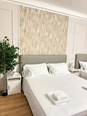Letto o letti in una camera di Cattaleya rooms