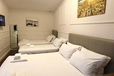 Letto o letti in una camera di Cattaleya rooms