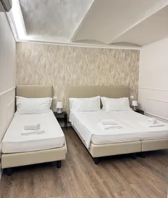 Letto o letti in una camera di Cattaleya rooms