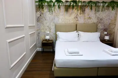 Letto o letti in una camera di Cattaleya rooms
