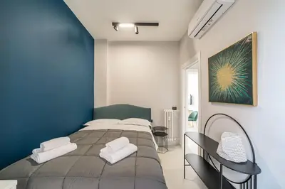 Letto o letti in una camera di The bright apartment