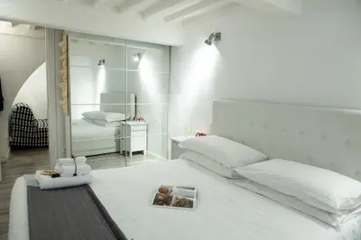 Letto o letti in una camera di Un Bacio a Firenze