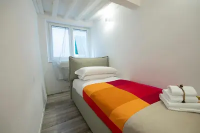 Letto o letti in una camera di Un Bacio a Firenze