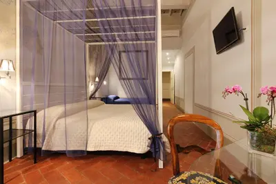 Letto o letti in una camera di Uffizi Harmony