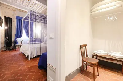Letto o letti in una camera di Uffizi Harmony