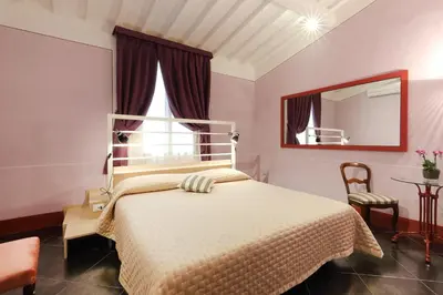 Letto o letti in una camera di Uffizi Harmony