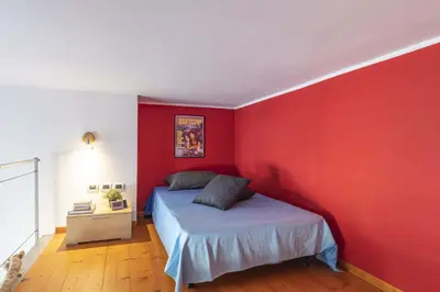 Letto o letti in una camera di Italian Experience-Florentine Careggi Loft