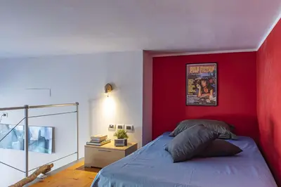 Letto o letti in una camera di Italian Experience-Florentine Careggi Loft