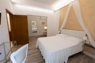 Letto o letti in una camera di LC41 Suites