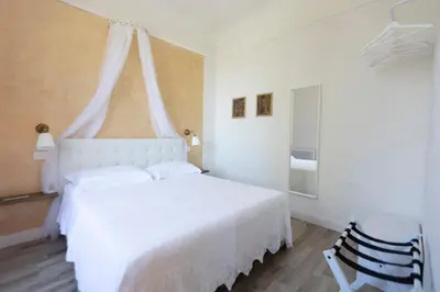 Letto o letti in una camera di LC41 Suites
