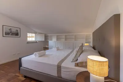 Letto o letti in una camera di Dora penthouse Uffizi view