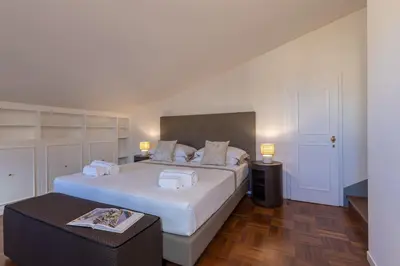 Letto o letti in una camera di Dora penthouse Uffizi view