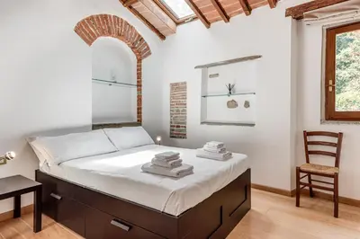Letto o letti in una camera di San Niccolò Tower Flat - Sweet Dreams in Florence