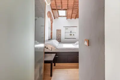 Letto o letti in una camera di San Niccolò Tower Flat - Sweet Dreams in Florence