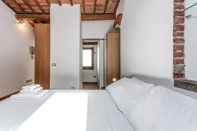 Letto o letti in una camera di San Niccolò Tower Flat - Sweet Dreams in Florence
