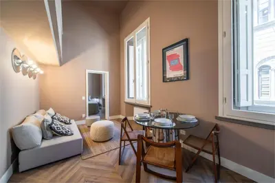 Area soggiorno di Stylish Apartment on the Lungarno in Florence