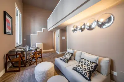 Area soggiorno di Stylish Apartment on the Lungarno in Florence