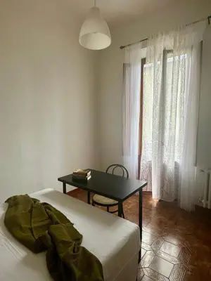 Letto o letti in una camera di eMMe Apartment