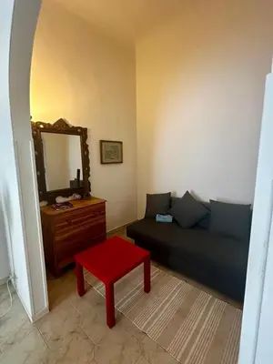 Area soggiorno di eMMe Apartment