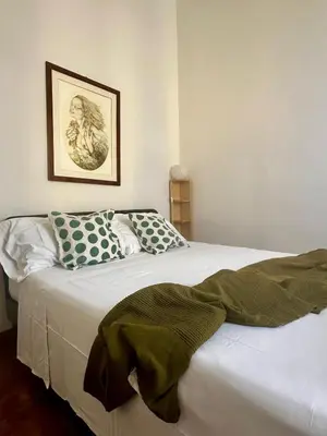 Letto o letti in una camera di eMMe Apartment