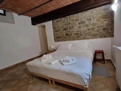 Letto o letti in una camera di Il Cortile di Viola