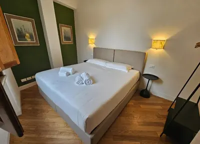 Letto o letti in una camera di Oriuolo Elegant Apartment