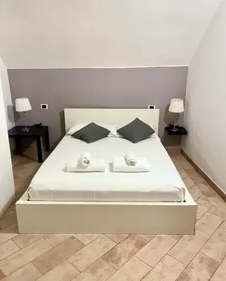 Letto o letti in una camera di Rifugio tranquillo in Costa dei Magnoli - Ponte Vecchio
