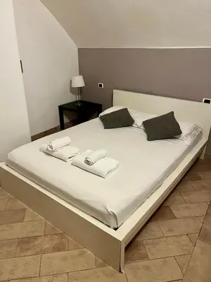 Letto o letti in una camera di Rifugio tranquillo in Costa dei Magnoli - Ponte Vecchio