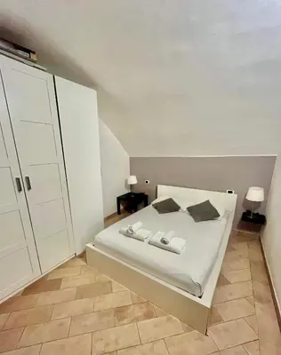 Letto o letti in una camera di Rifugio tranquillo in Costa dei Magnoli - Ponte Vecchio