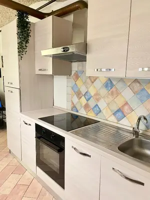 Cucina o angolo cottura di Rifugio tranquillo in Costa dei Magnoli - Ponte Vecchio