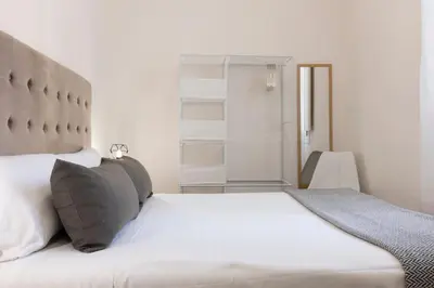 Letto o letti in una camera di Santo Spirito Living