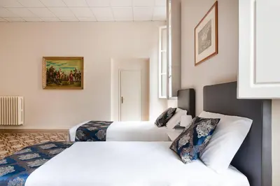 Letto o letti in una camera di Hotel St. James