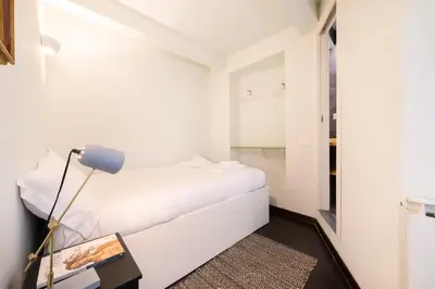 Letto o letti in una camera di Pitti Cozy House
