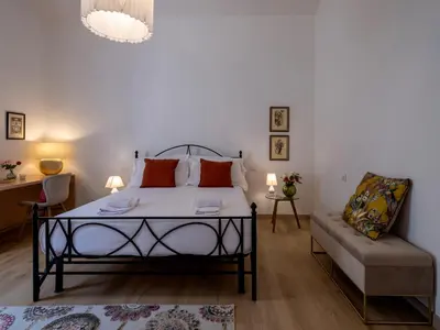 Letto o letti in una camera di Tuscan Tempo 2 Double Bedrooms Apt a stone's throw from the center