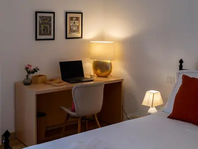 Letto o letti in una camera di Tuscan Tempo 2 Double Bedrooms Apt a stone's throw from the center