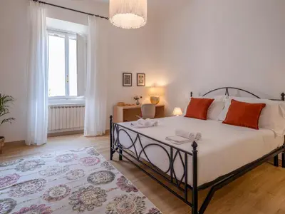 Letto o letti in una camera di Tuscan Tempo 2 Double Bedrooms Apt a stone's throw from the center