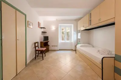 Letto o letti in una camera di Mattonaia by Mmega